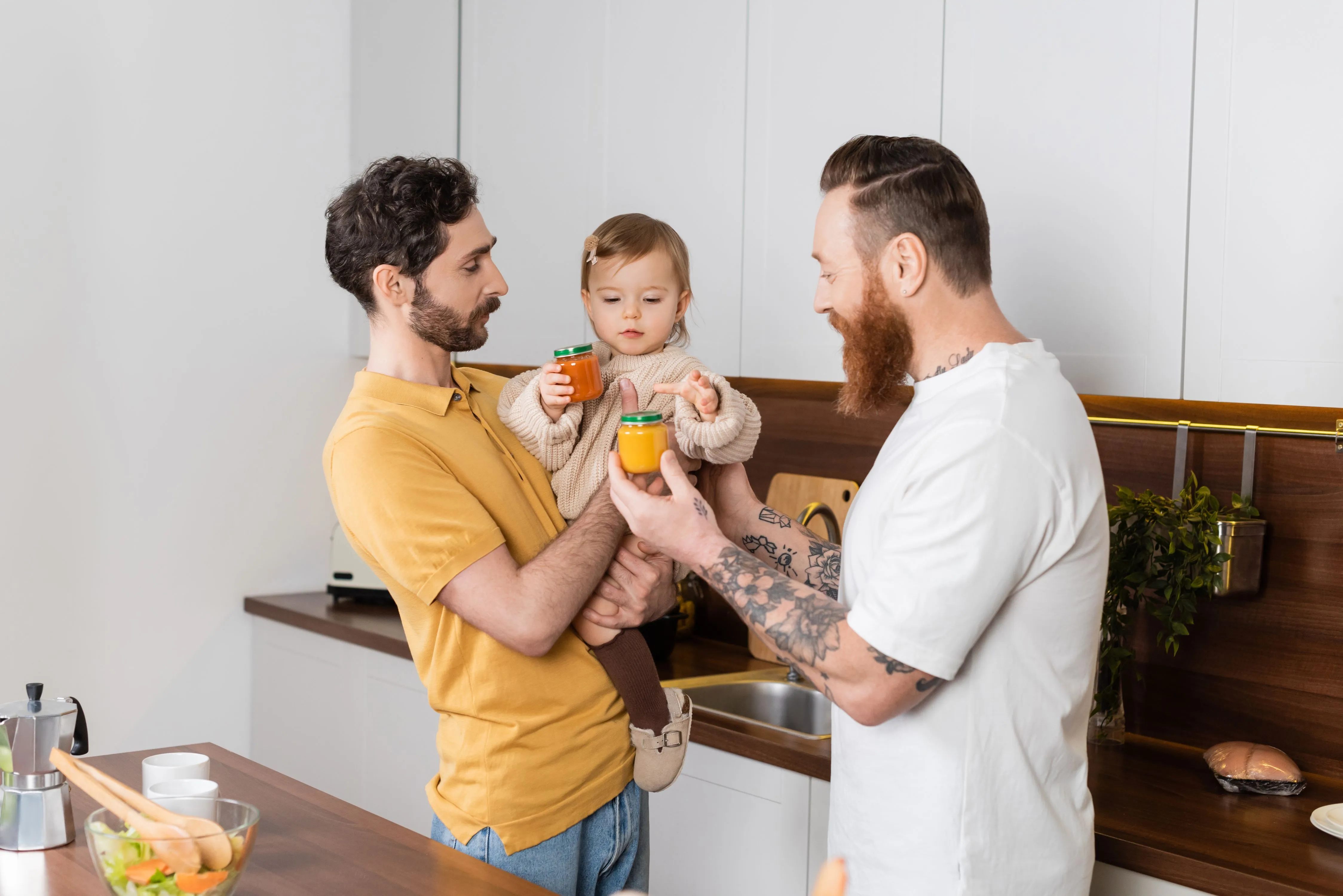 Fathers and baby picking out food